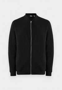 Sort zip-up sweatshirt med ståkrave, ribbede manchetter og en glat tekstur. Har en sølvfarvet lynlås og ingen synlige mønstre.