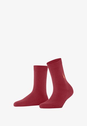 Rote Baumwollsocken mit gerippten Bündchen, nahtlosen Zehen und einem kleinen gestickten Logo. Weicher Stoff und Rumpflänge, die für Komfort sorgt.