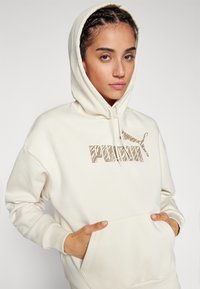 Puma ANIMAL HOODIE  - Jersey con capucha - alpine snow