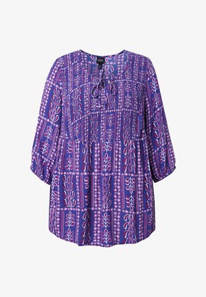 Lila Tunika-Bluse mit floralem Muster, mit Schleifenkragen, dreiviertel Ärmeln und lockerem Sitz aus leichtem Stoff.