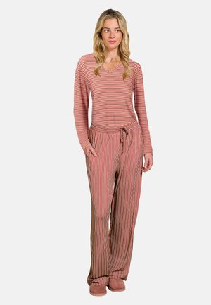 Striped lounge set in red and beige, featuring a long-sleeve top with a V-neck and drawstring waist pants with pockets. Soft fabric.