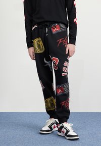 Jordan Pantalones deportivos - black/sail