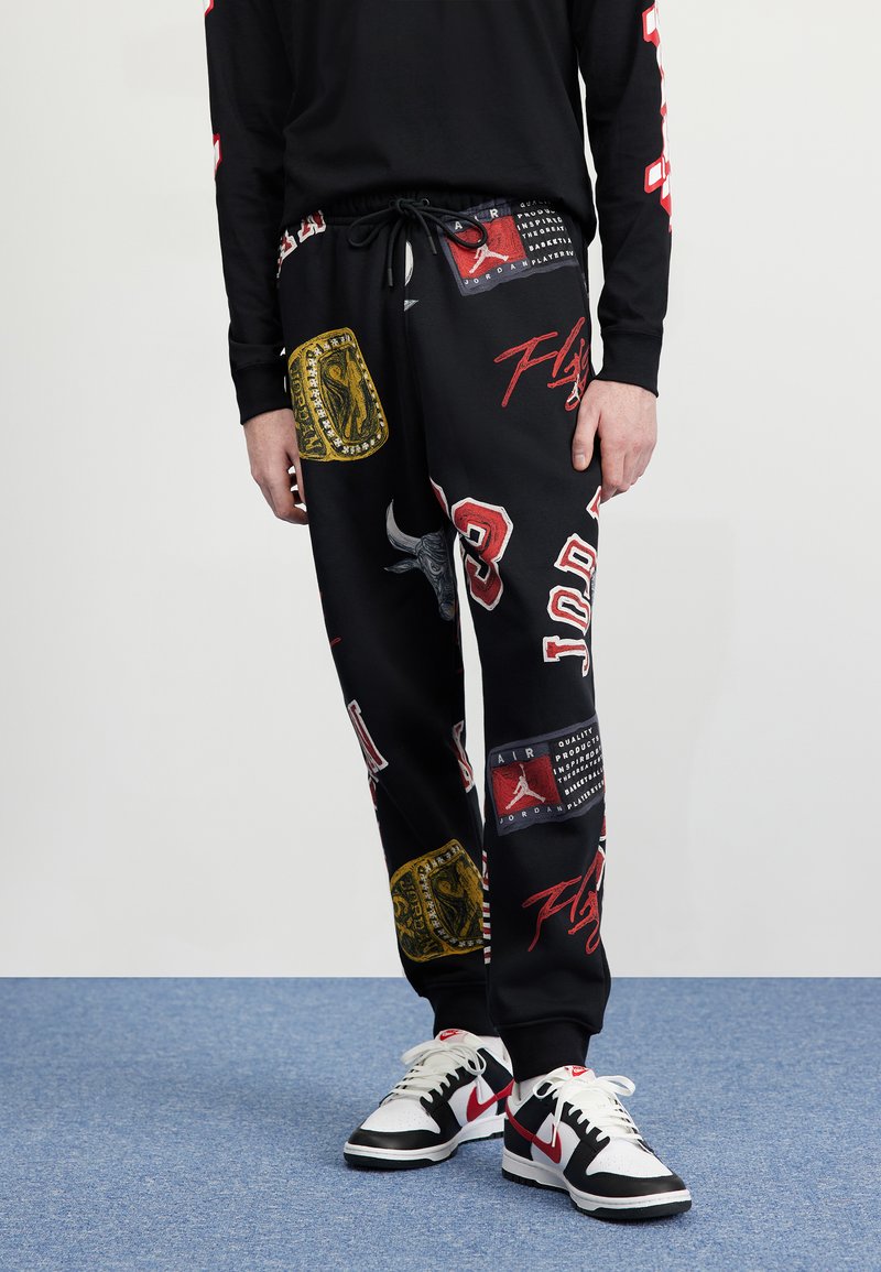 Jordan Pantalones deportivos - black/sail