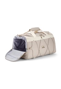 Borsa da viaggio in tessuto beige con fodera interna grigia rimovibile. Presenta manici superiori, cerniere e dettagli elastici con bungee sui lati.