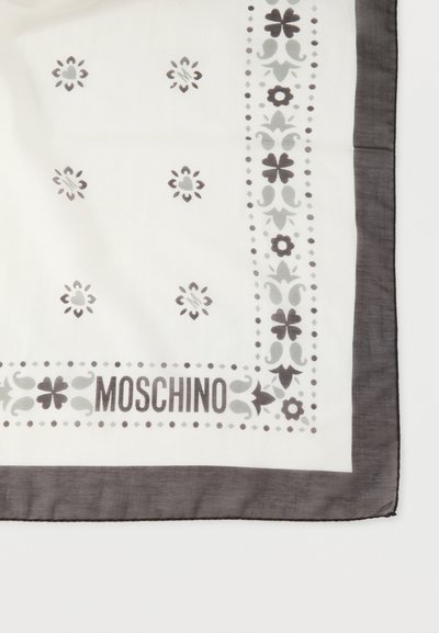 White silk scarf with gray floral patterns and dark gray border. Features "MOSCHINO" text and detailed accents along the edges.