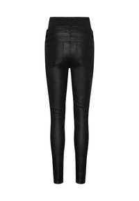 Leggings en similicuir noir avec une taille haute, une coupe ajustée et des poches arrière. Texture lisse et design épuré renforcent leur look contemporain.