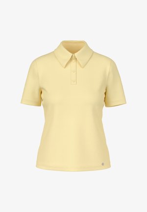 Kurzärmliges Poloshirt in Hellgelb mit spitzem Kragen und dreiknöpfiger Knopfleiste. Hergestellt aus glattem, strukturiertem Stoff.