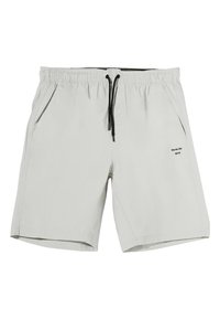 Shorts gris clair avec une taille élastique, un cordon noir, deux poches latérales et un petit graphique textuel près de la poche gauche.