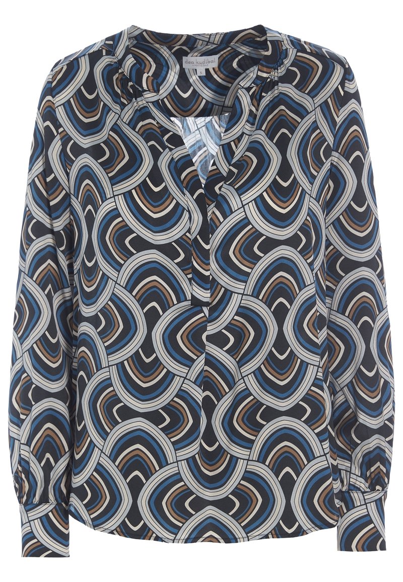 Blouse ample à manches longues, avec une base marine, des motifs géométriques en vagues bleues, marron et crème, et un décolleté en V.