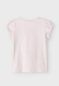 Różowa koszulka z krótkim rękawem, okrągłym dekoltem i zgromadzonymi rękawami. Gładki materiał bawełniany o klasycznym, luźnym kroju.