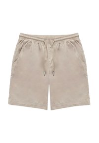Pantaloni corti beige con una cintura elastica e cordino. Presentano due tasche laterali e dettagli di cucitura discreti lungo l'orlo.