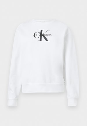 Sweat-shirt blanc à manches longues avec col rond, présentant le logo "calvin klein cK" en noir centré sur la poitrine.