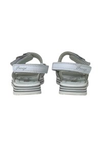 Sandali bianchi con accenti grigi e cinturini regolabili. Presentano una soletta imbottita e una suola a righe. Logo e motivo floreale visibili all'interno.