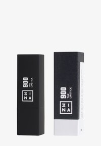 To rektangulære leppestiftbeholdere, den ene matt svart med hvit tekst, den andre med et teksturert svart og hvitt design, merket "900 THE LIPSTICK."