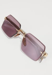 Eyewear by David Beckham Sonnenbrille - gold-coloured/crystal