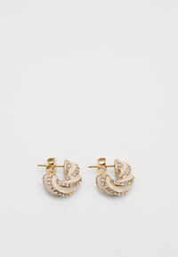 Gold-tone earrings featuring a spiral design with textured accents and small clear rhinestones along the edges. Closed post-back closure.