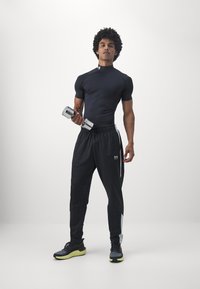 Under Armour - Koszulka sportowa