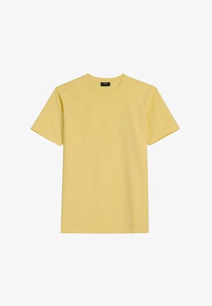 Żółta, bawełniana koszulka z krótkim rękawem i okrągłym dekoltem, o gładkim wzorze, z małym wyszywanym logo na lewej piersi.