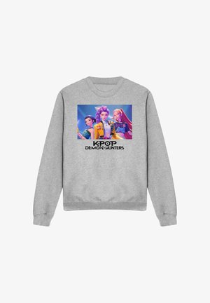 Gray sweatshirt featuring a front graphic of three animated characters and the text "KPOP DEMON HUNTERS" underneath. Casual design, fleece material.