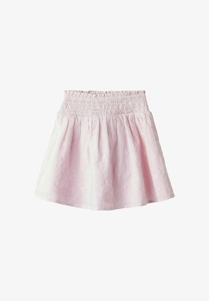 Pink, textured skirt with a smocked waistband and floral pattern, featuring a flared design and gathered ruffles at the hem.