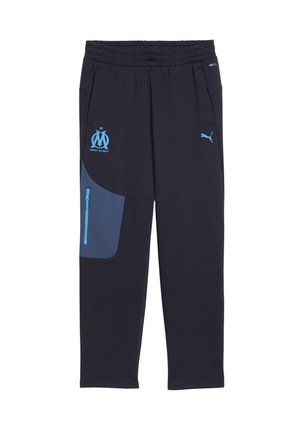 Navy blue athletic pants with a light blue logo, elastic waistband, side pockets, and contrasting blue fabric panel on the left thigh.