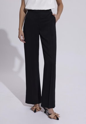 Makalu - Spodnie materiałowe