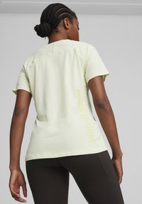 Puma SEASONS - Triko s potiskem - green illusion