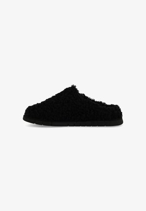 Pantofole nere con esterno soffice e testurizzato e suola liscia e flessibile. Design slip-on con forma arrotondata e stile minimalista.