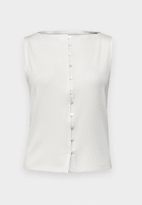 Haut sans manches blanc avec une texture côtelée et un col rond. Doté de sept boutons assortis à l'avant et de fentes sur les côtés à l'ourlet.