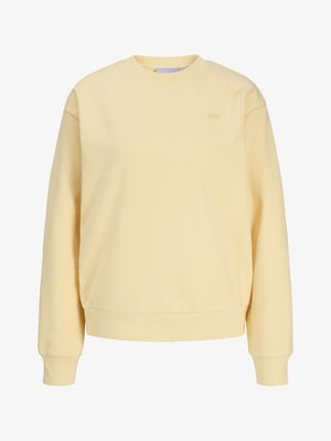 Šviesiai geltona ilgomis rankovėmis, apvalia iškirpte suknelė, subrėžtomis rankogaliais ir apačia, subtiliu „JJXX“ logotipu kairėje krūtinės pusėje.