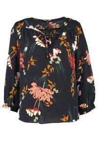 Zwarte bloemenblouse met lange mouwen, voorzien van een strikdetail bij de hals. De stof heeft een gladde textuur met heldere oranje, roze en groene bloemenpatronen.