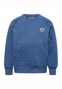 Blå sweatshirt i texturerat material, med ett diamantm önster på axlarna och en framficka. Litet logotypaccent på bröstet.