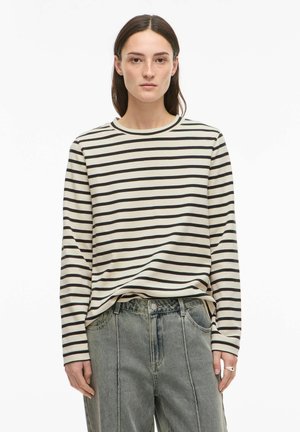 - Bluzka z długim rękawem