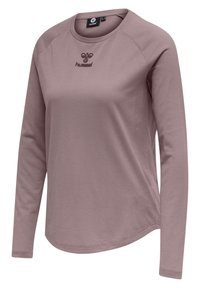 Långärmad skjorta i mjukt mauve-tyg, med rundad halsringning och mönstrad textur. Hummel-logotyp i en mörkare nyans på bröstet.