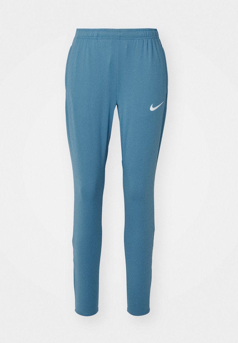 Blaue Sporthose mit taillierter Passform, elastischem Bund und kleinem weißen Nike-Logo auf dem linken Oberschenkel. Glattes, leichtes Material.