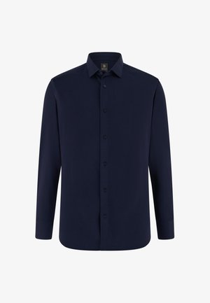 Camicia da uomo blu navy a maniche lunghe con chiusura frontale a bottoni e colletto appuntito, mostrata su sfondo bianco.