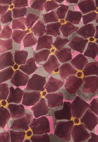 Fabric featuring a floral pattern with dark red and pink flowers, yellow centers, and a muted gray background. Smooth texture.