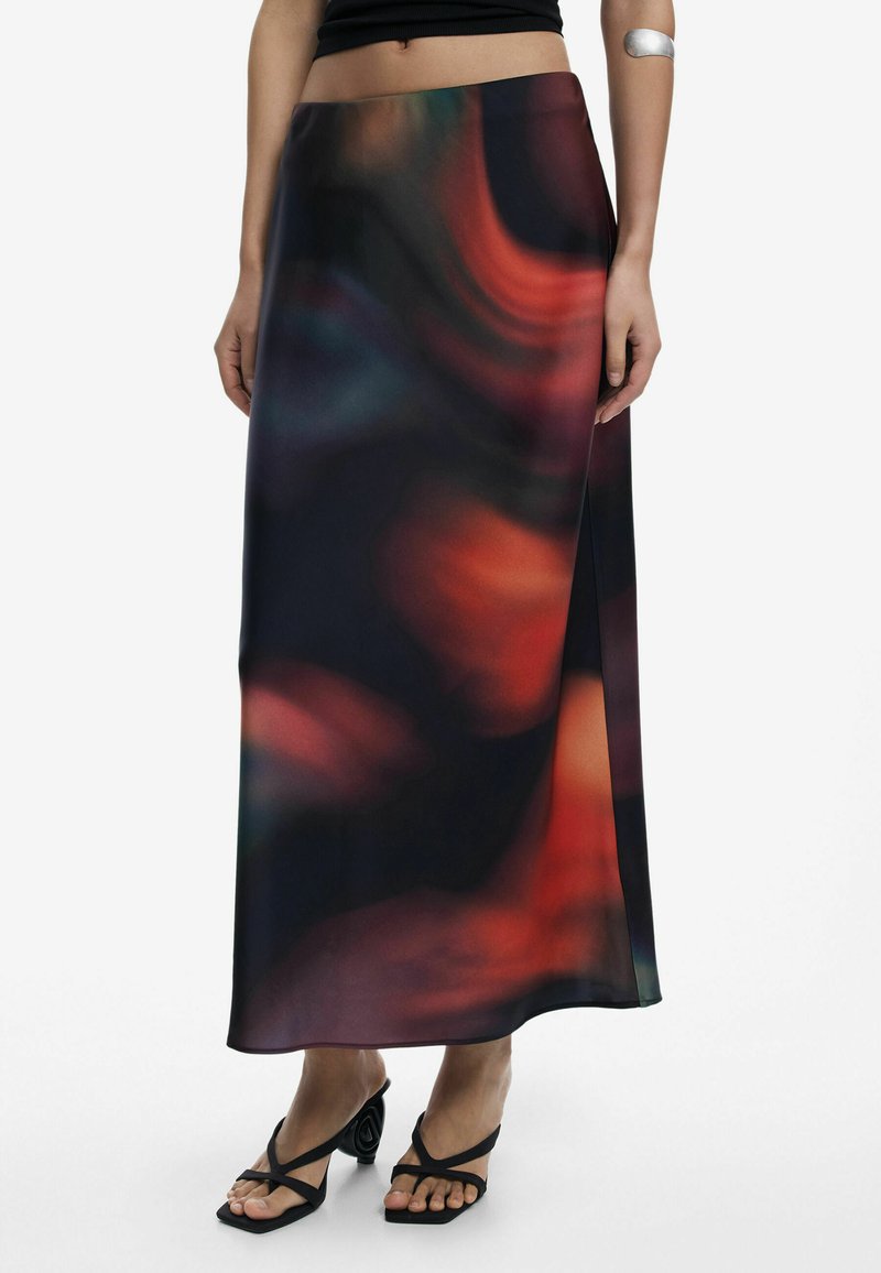 A long, flowing black skirt featuring a swirling pattern of red and blue hues. Made of lightweight fabric with a slit on one side.