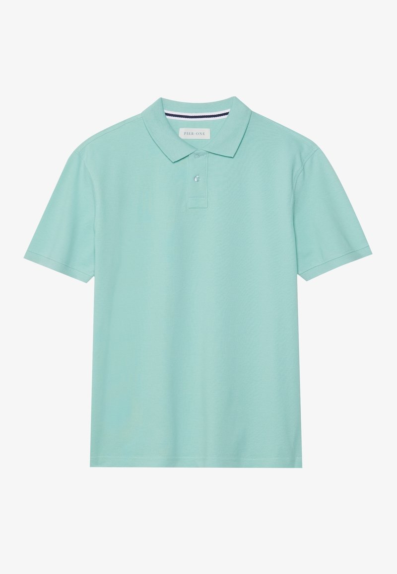 Polo manches courtes vert clair avec un col et deux boutons, présenté à plat sur fond blanc.