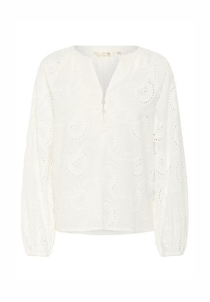 White long-sleeve blouse with a rounded neckline, featuring a button placket and intricate embroidered paisley pattern with cutouts.
