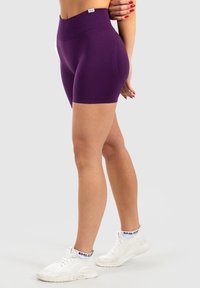 Smilodox HIGH WAIST SEAMLESS SCRUNCH PHELIA - Tights - violett