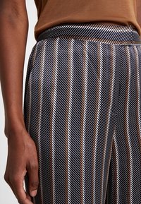 someday. Tygbyxor - blue