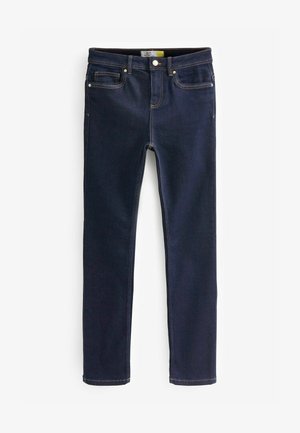 Jeans en denim bleu foncé avec une coupe slim, dotés d'un design classique à cinq poches, de rivets en cuivre et de coutures jaunes contrastantes.