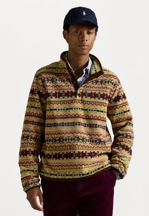 Fleece pullover in multicolored patterned knit with yellow, red, and green stripes. Features a brown collar and buttoned neckline.