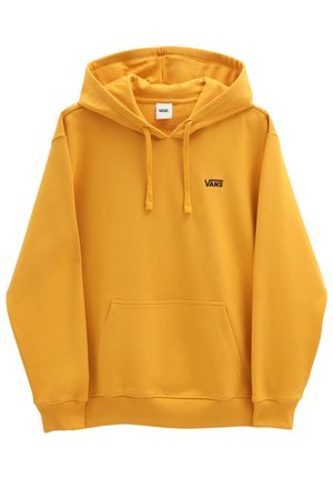 Žlutá mikina Vans s kapsou na břiše ve tvaru klokánky, nastavitelnou kapucí se stahovací šňůrkou a malým černým logem Vans na levé straně hrudi.