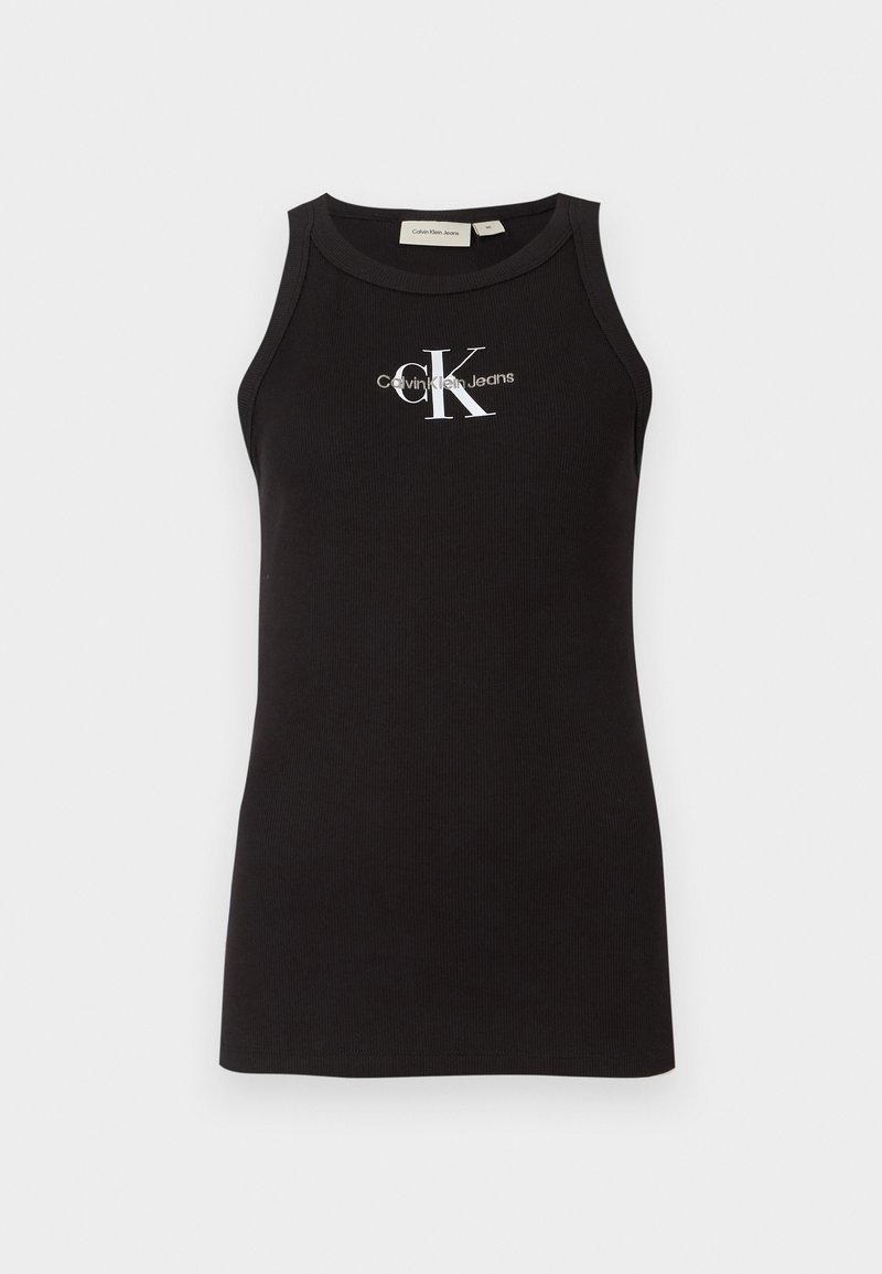 Czarny prążkowany top na ramiączkach z okrągłym dekoltem. Na froncie znajduje się biały logo "Calvin Klein Jeans" oraz stylizowana litera "K".