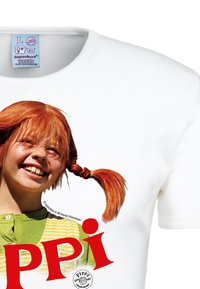 White cotton T-shirt featuring a print of a smiling girl with red hair in pigtails, wearing a green and white striped shirt, with bold red "PPI" text.