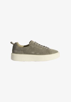Gray suede sneaker with a thick white rubber sole and gray laces. Features a circular toe cap and a fabric loop at the heel for easy wear.
