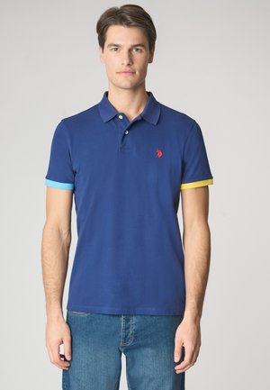 A MANICHE CORTE IN STRETCH CON DETTAGLI COLORATI - Polo - blue