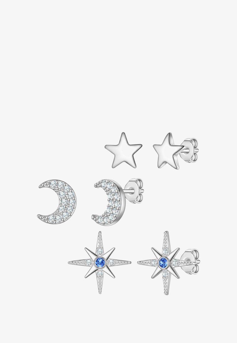 Trīs auskari: viens pusmēness ar caurspīdīgiem akmeņiem, viens gluds zvaigzne, un viens zvaigzne ar zilu centrālo akmeni, visi ar sudraba tonējumu.